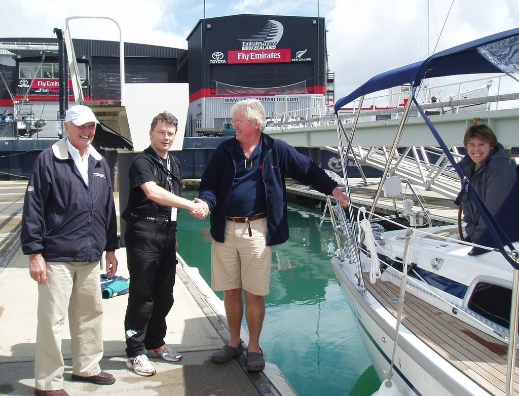 Manfred Lange hands his new B33 Cruiser, Tangaroa over to Rob Thexton of CharterLink  © Jane Pares - IMB